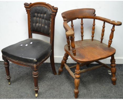 A smokers bow back elbow chair;  a Victorian carved mahogany button back dining chair (2)