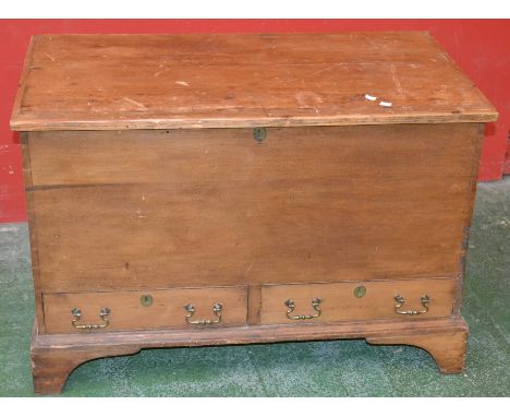 A stripped pine mule chest, hinged cover, candle box, two short drawers to base, bracket feet, 68cm high x 100cm wide x 55cm 