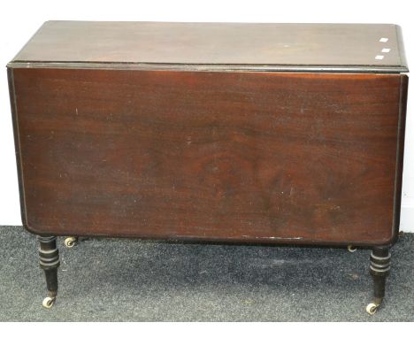 A Victorian rosewood dropleaf table, turned legs, ceramic casters 