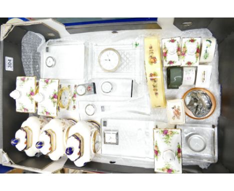 A collection of ceramic and glassware mantle clocks including Royal Albert Old Country Roses,. Aynsley Orchard Gold, Masons M
