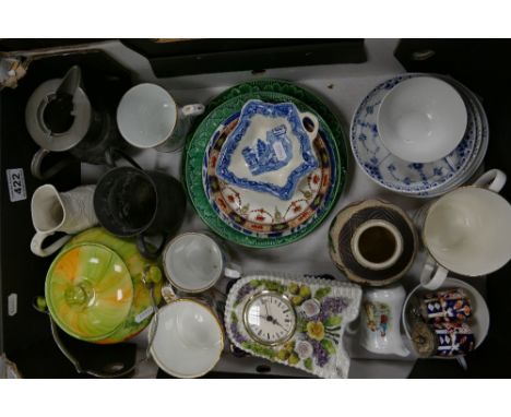 A mixed collection of ceramic items to include Oriental decorated pewter jug, early 20th century plates, embossed jugs, hand 