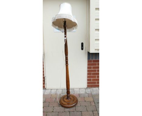 Oak turned lamp stand.