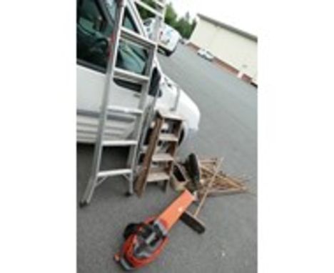 A mixed collection of outdoor related items to include brushes, racks, shovels, with a flymo blower, two metal steps ladder a