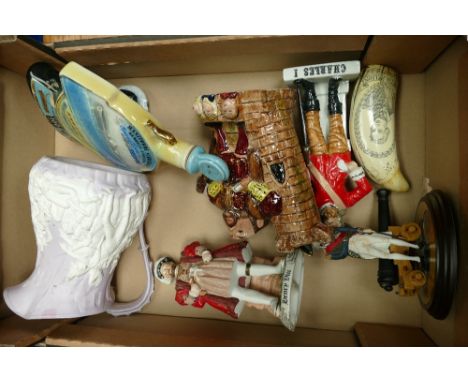 A mixed collection of items to include - Napoleonic themed embossed water jug, Continental figures of Henry VIII and Charles 