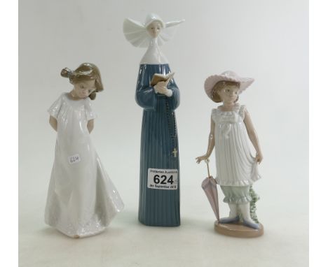 A Lladro figure of a nun 5500 with 2 Nao figures of children 1126 and 1109 (3).