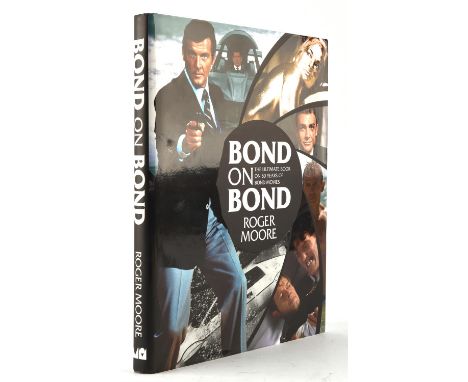 James Bond Roger Moore - Bond on Bond book, signed to the illustration page by Roger Moore, published by Michael O'Mara Books