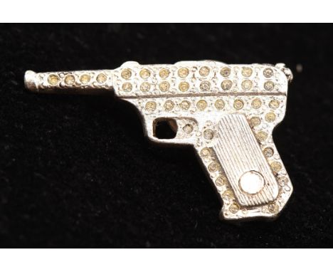 James Bond - 007 Yves Saint Laurent gun badge, stamped made in France YSL to rear. Condition Report:  light wear