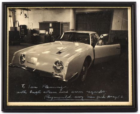 A lot of 3 original press photographs all featuring James Bond author Ian Fleming (1908  1964) with Studebakers, including a 