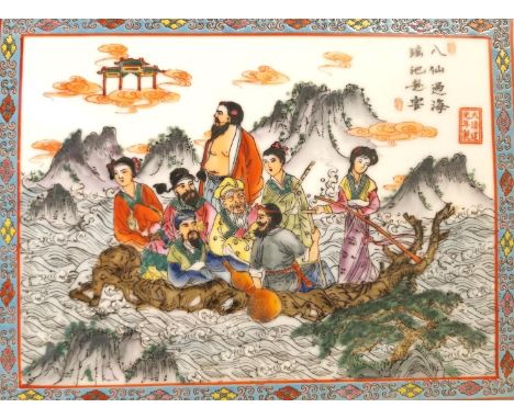 A framed 19th century Chinese hand painted porcelain plaque depicting the eight immortals in a boat with red seal mark. H.27 