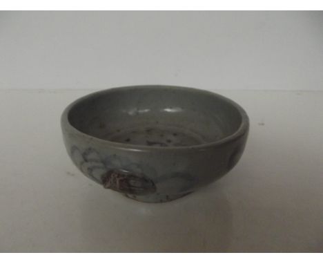 Green glazed footed bowl with museum ticket, Ming to early Qing period 