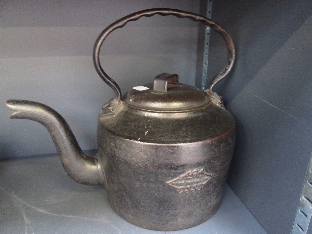 A vintage black cast iron eight pint kettle by Holcroft