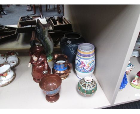 A selection of ceramics including 19th century copper lustre Toby jug, Poole pottery, Royal Bonn Old Dutch squat vase etc