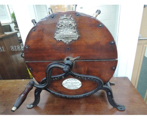 A Victorian knife sharpener/cleaner by Kent with brass and enamel plaque, improvements patented 1865 and 1870, 199 High Holbo