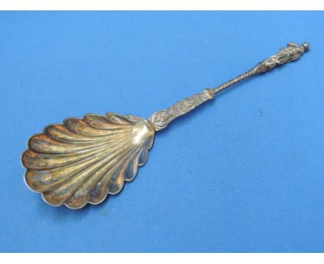 A silver serving apostle spoon having scalloped gilt bowl and twist handle,  London 1893, William Hutton & Sons Ltd