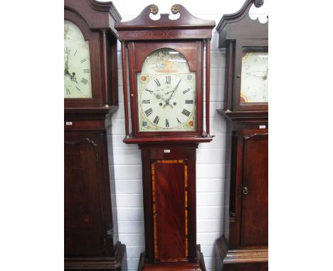 A late 18th/early19th century mahogany longcase clock having swan neck and pillar hood containing arch painted dial on inlay 