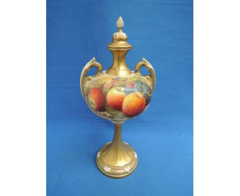 A Royal Worcester two handled bulbous lidded vase on stem having gilt heightened fruit decoration by Ricketts