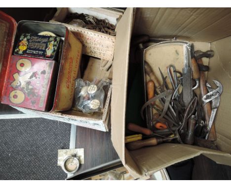 Three boxes of various vintage music and organ related spares and tools including vintage tins, electric motor etc