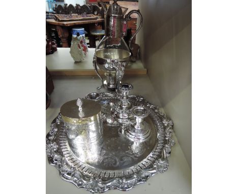 A selection of plated ware including, candle sticks, caddy and trays