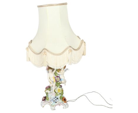 DRESDEN - an ornate Dresden table-top lamp with shade, with cherub and floral design, height including lamp 55cm 