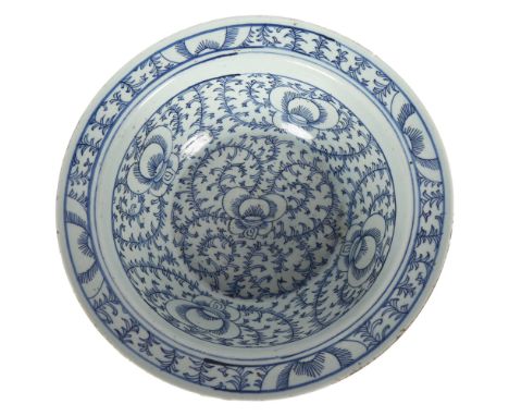 A Chinese Qing Dynasty porcelain basin or bowl, with blue and white scrolling peony decoration, diameter 37.5cm, height 13cm