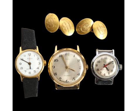 A pair of unmarked yellow metal cufflinks with monogramed panels, 2 lady's wristwatches, and a gent's Timex wristwatch 