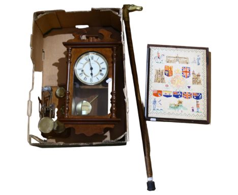 A framed Antique needlework picture, depicting various Commonwealth flags and associated scenes, a modern wall clock, a set o