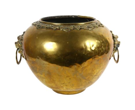 A large Chinese brass jardiniere, with applied engraved and pierced collar with lion mask ring handles, W50cm, H35cm 