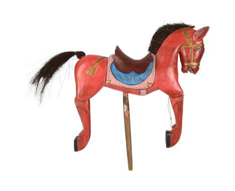An Oriental carved and painted wooden horse puppet, L36cm 