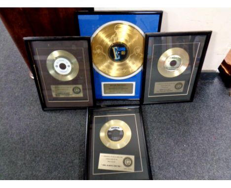 An Elvis Presley '68 comeback special gold plated etched disc No. 177 of 2500, in frame, together with three further limited 