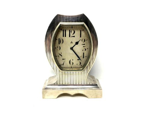 A good quality Art Deco silver cased 8 day mantel clock, Birmingham 1919 CONDITION REPORT: 14cm high by 10.5cm wide by 4.5cm 