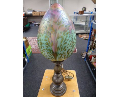 An Art Deco style table lamp with an iridescent glass shade 