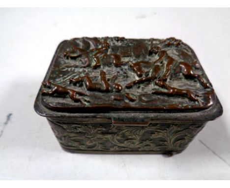 An antique plated embossed snuff box depicting a hunting scene (as found)   
