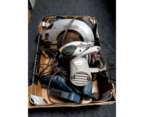 A box of power tools : Makita and Pro circular saw, Black &amp; Decker sander  