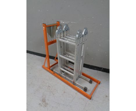 A folding aluminium multi purpose ladder together with a log horse  