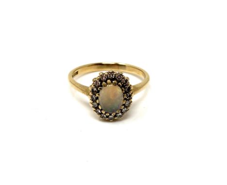 A 9ct gold opal and diamond ring, size M 