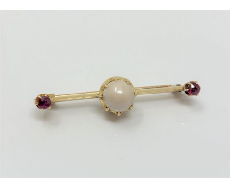 A yellow gold ruby and cultured pearl bar brooch CONDITION REPORT: Apparently unmarked. 4.5g
