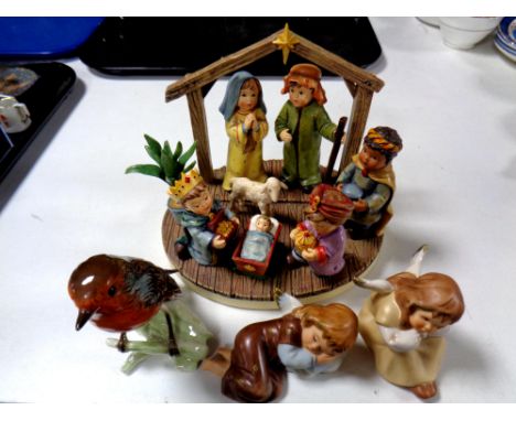 A Hummel figure, O Holy Night, 2016 first issue, together with two further Goebel figures, Angels, and a Goebel figure of a r