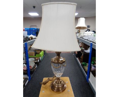 A brass and cut glass table lamp with shade 