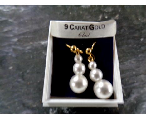 A pair of 9ct gold and pearl earrings 