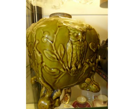 A Wedgwood green glazed pottery square form lamp base decorated with owls and bats. 18cm high