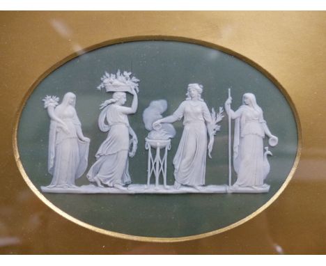 An antique oval Wedgwood green Jasper ware plaque of classical figures. 10 x 15cm