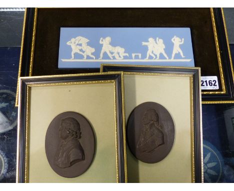 A Wedgwood blue Jasper ware figural plaque entitled Blind Man's Bluff together with two Basalt oval portrait medallions, Josi