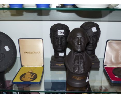 Two Wedgwood black basalt busts of lester K Piggott OBE, a circular plaque with a bust portrait of an American Indian and a b