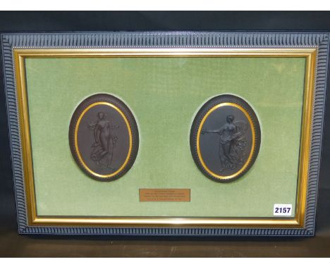 A framed pair of Wedgwood black Basalt oval plaques with gilt banding of classical figures, apparently a limited edition. 15.