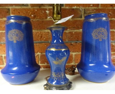 A pair of Royal Worcester blue tapered form bases with stylized floral gilt decoration. 30cm high together with a similar vas