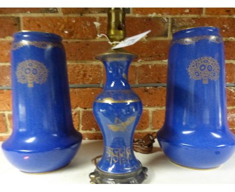 A pair of Royal Worcester blue tapered form bases with stylized floral gilt decoration. 30cm high together with a similar vas