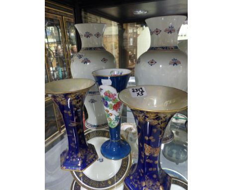 A pair of Wedgwood Vieux Roven pattern tall cases. 38cm high together with a pair of Crown Ducal flared blue vases and a Spod