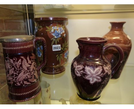 Four pieces of 19th/20th Century brown glazed pottery, a cylinder form lamp base, a studio vase and two jugs