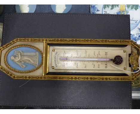 An unusual French gilt and painted wall thermometer by Wandenberg Freres, Paris. Oval blue jasper ware classical medallion to