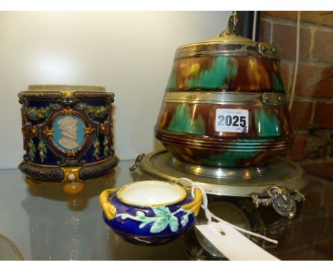 An Egyptian revival Victorian silver plate mounted Majolica biscuit barrel, a Wedgwood portrait decorated   footed jar and a 